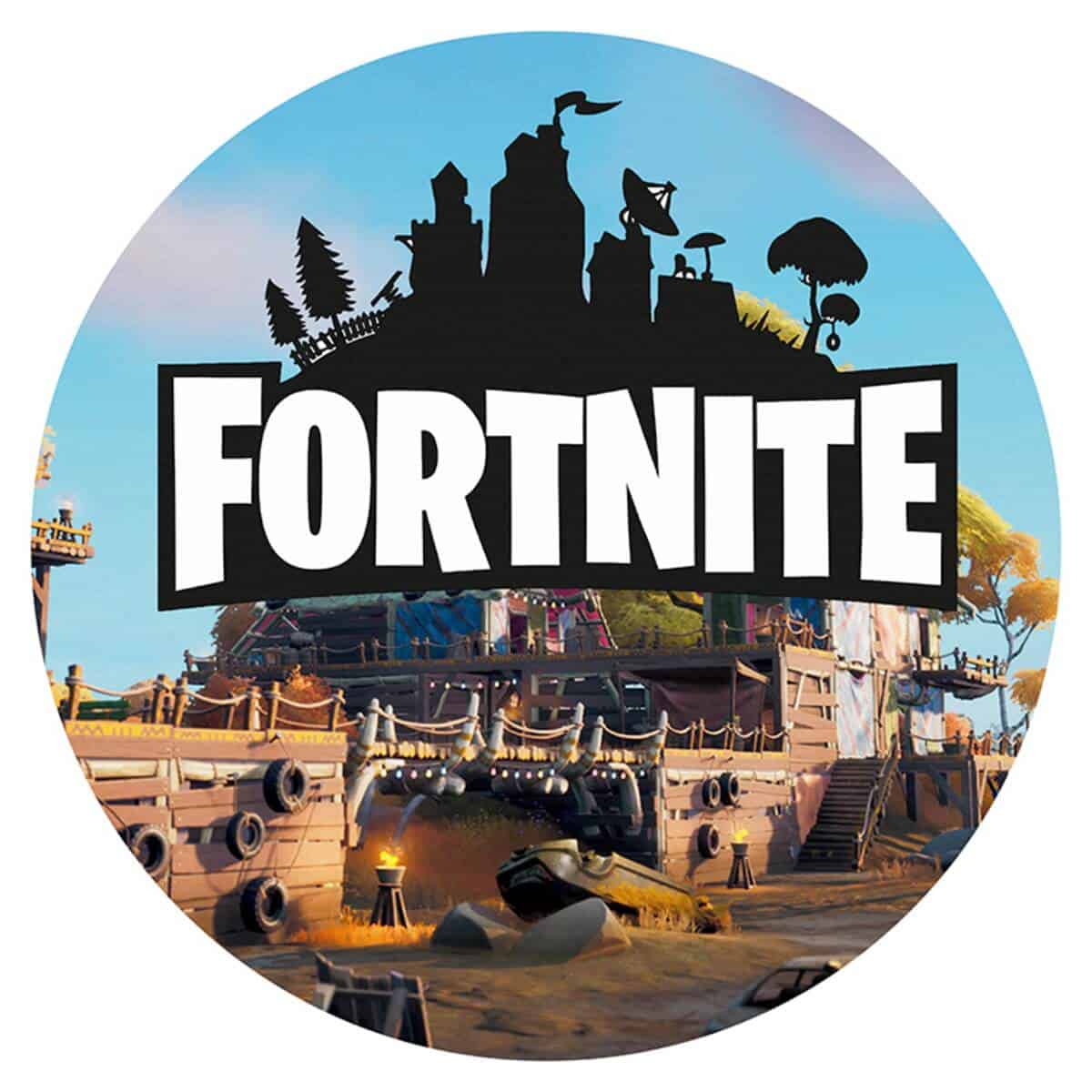 Kunstnerisk Fortnite-inspireret kageprint design med spøgelsesby, piratskibe og fantasy elementer.